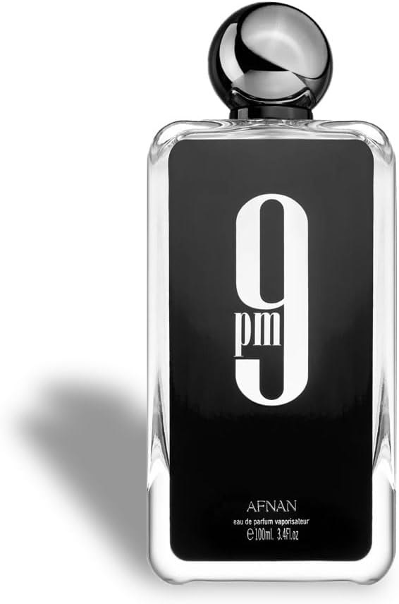 Perfume bottle with black label and silver cap on a white background