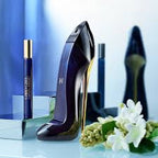 High-heeled shoe with a bottle of perfume and flowers on a reflective surface